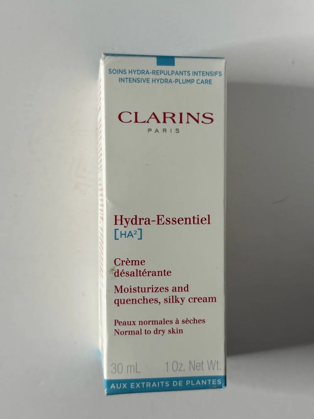 Clarins Hydra-Essentiel Moisturizer – White with Blue Accents